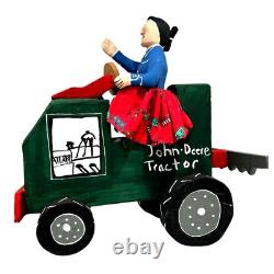 Sculpture en bois d'art populaire navajo de Delbert Buck - Femme et tracteur John Deere - Signé