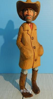 Sculpture sur bois de cowboy, caricature de l'Ouest américain, originale de 1983 par Claude Bolton