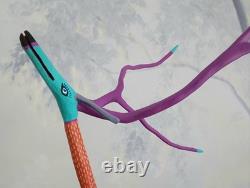 Sculpture sur bois en cèdre d'art populaire : Coyote à longues bras