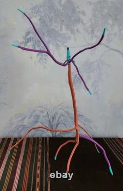 Sculpture sur bois en cèdre d'art populaire : Coyote à longues bras