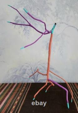 Sculpture sur bois en cèdre d'art populaire : Coyote à longues bras