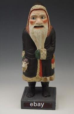 Traditions Folk Art Williamsburg Père Noël sculpté à la main en robe noire - 13 Charles Robb