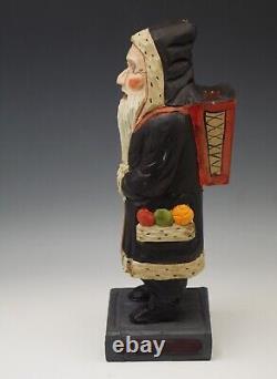 Traditions Folk Art Williamsburg Père Noël sculpté à la main en robe noire - 13 Charles Robb