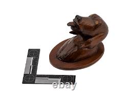 Une tête sculptée en bois vintage de l'art populaire sculpté